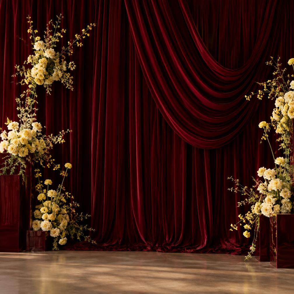 Burgundy velvet draped luxe backdrop